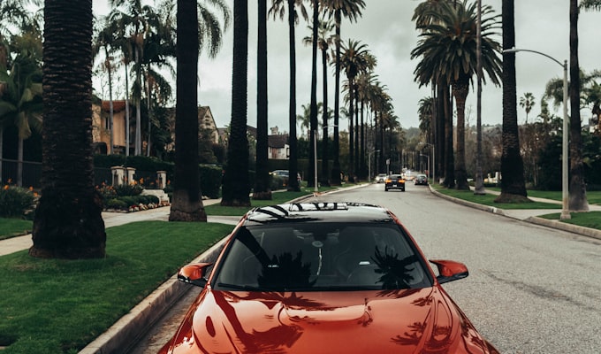 Driver comparing auto insurance rates on laptop